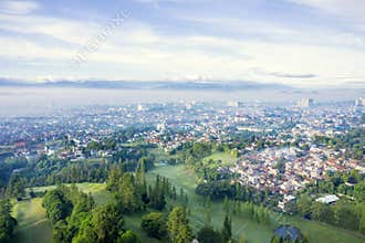 Dense houses and golf course in Bandung city