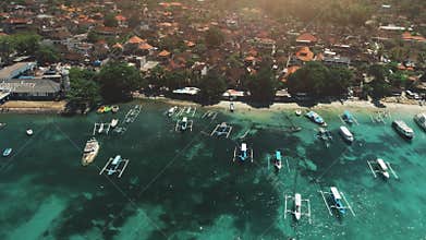 Aerial drone flight over crystal ocean harbor bay
