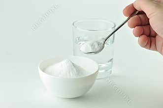 Baking soda and glass of water