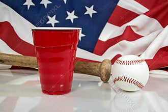Red party cup with baseball and bat
