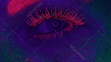 Woman with UV fluorescent makeup