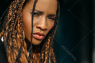 Sad African American woman. Distrustful emotion