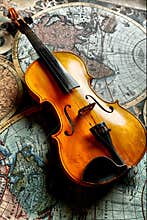 Classic violin on worldmap