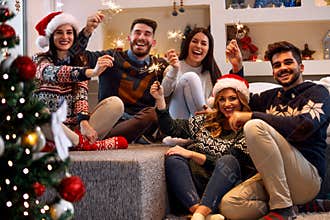 Christmas sparklers- people enjoying party on Christmas