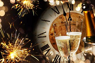 New Years background with sparklers and champagne