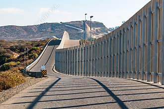 International Border Wall Between San Diego and Tijuana Extending into Distant Hills
