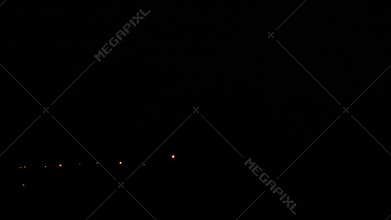 Strong thunderstorm with lightning at night.