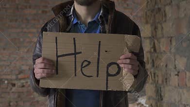 Homeless with plate `help`