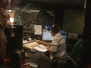 Disc Jockey in Radio Station