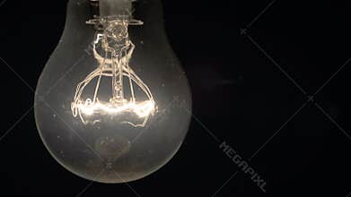 Incandescent lamp turns on, it shines brighter and brighter and burns out
