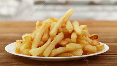 Delicious french fries on a plate