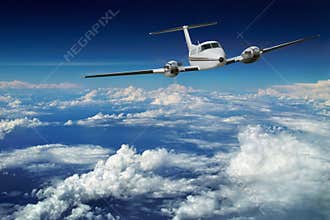 Luxury airplane. Blue sky flight.
