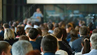 Audience listens to the lecturer
