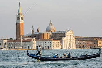 Tourists on a Gondola, Venice, San Giorgio Maggiore Island, Venice, Italy
