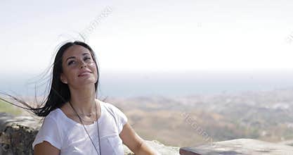 Dreaming woman enjoying views of nature
