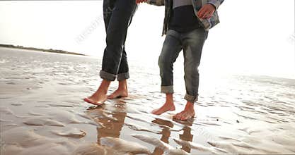 Walking on the Wet Sand