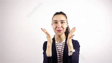 Brunette beautiful young woman, loudly speaking, wow, and smiling at the camera.