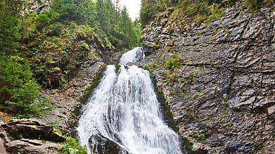 Bride`s Veil waterfall in the Carpathian mountains in the Transylvania region of Romania