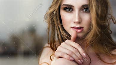 Fashion woman`s portrait in boudoir room. Close up portrait of sensual beautiful redhaired woman.