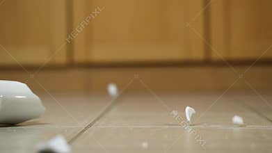 Cup hitting the ground