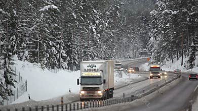 Cars driving on country road