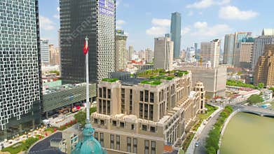 SHANGHAI, CHINA - JULY 2016: Aerial drone view of shanghai post office tower with clocks, sculpture