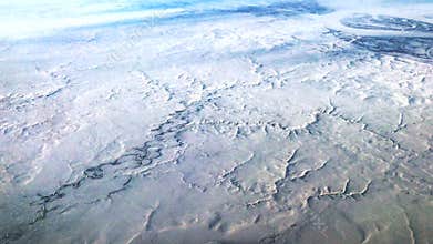 Snow covered arctic landscape aerial view