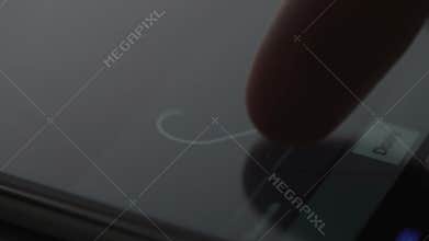 Person putting signature on modern gadget touchscreen closeup, authorization