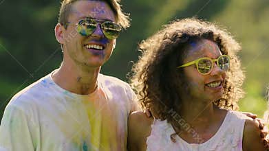 Emotional festival entertainment of happy excited teenagers, extra-slow motion