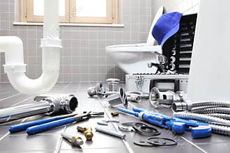 plumber tools and equipment in a bathroom, plumbing repair service, assemble and install concept