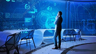 Data scientist looking at the transparent screen and thinking