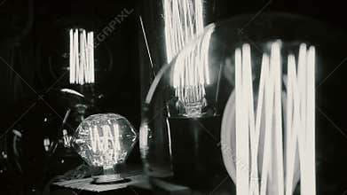 Tungsten light bulbs illuminating old research laboratory, obsolete technology