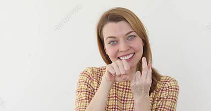 Girl showing middle finger smiling and you