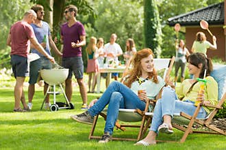 Women chatting on a garden party