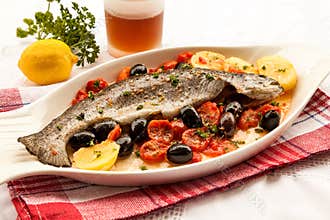 Fish with tomatoes and olives