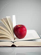 Red apple on books