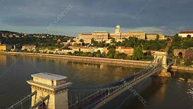 Budapest, Hungary - 4K aerial view of Szechenyi Chain Bridge at sunrise with River Danube