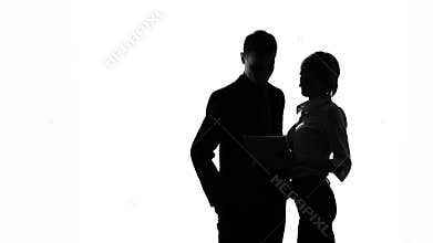 Shadow of employees passionately hugging and kissing in office, lovers cheating