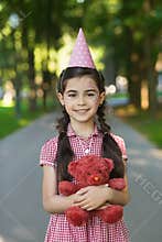 Happy birthday girl in park