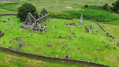 Ruins of an old church and cemetery in Scotland - aerial drone footage