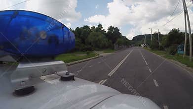 First aid transport driving city street, risky profession, medical assistance