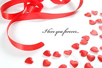 Love background. Small hearts and ribbon