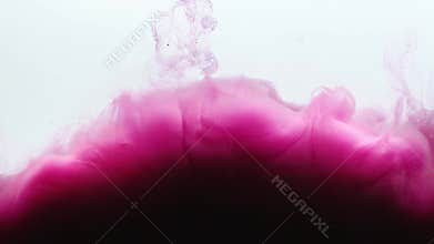 Purple ink in white water.