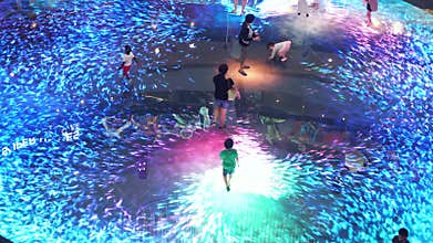 Singapore, 26 May 2018. Large screen augmented reality experience on the floor. Digital Light Canvas at Marina Bay Sands