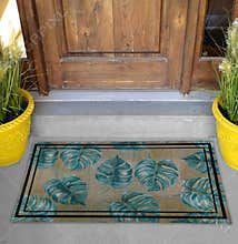 Classic green leaves Outdoor Door mat with twin black borders outside home with yellow flower pots