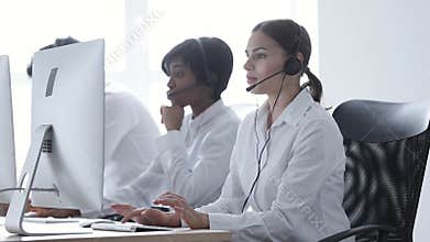 Call Center. Smiling Woman In Headset Working At Computer
