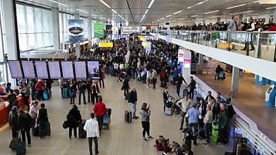 Travelers at Schiphol airport, Amsterdam