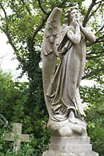 Mourning angel and cross