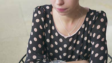 Artist sketching female model using crayon at cafe
