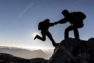 Climbers` aid scene and summit success